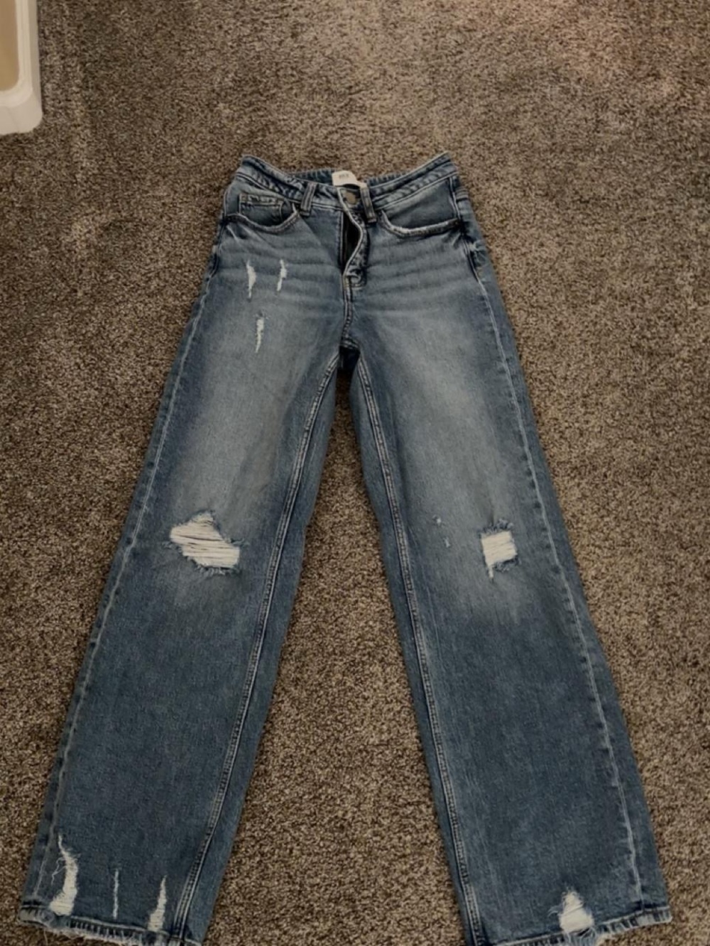 Buckle Distressed Wide Leg Jeans in Medium Blue
